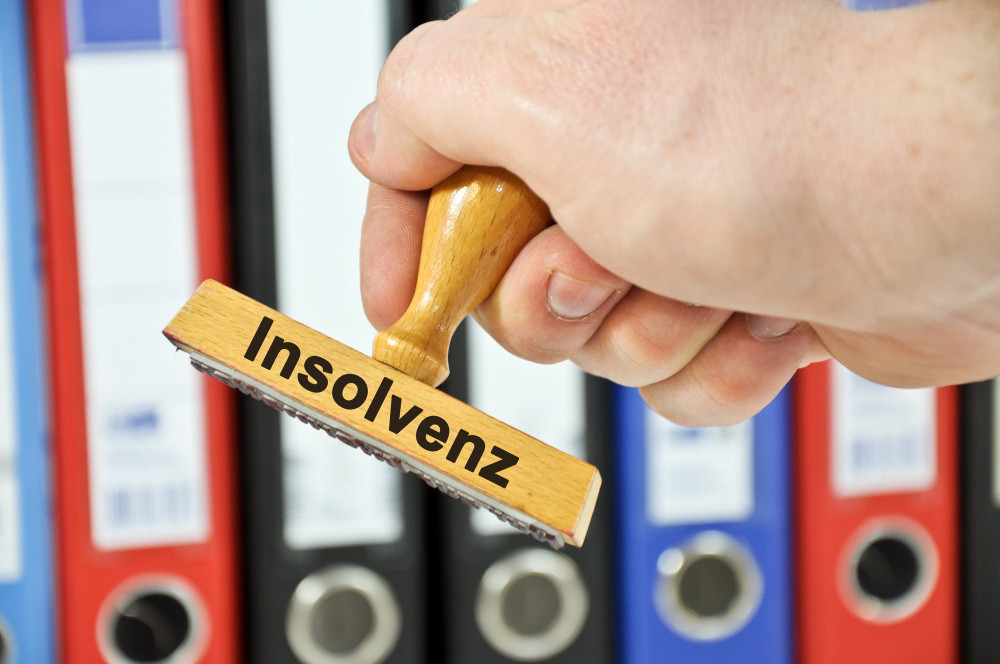 Stempel mit Insolvenz