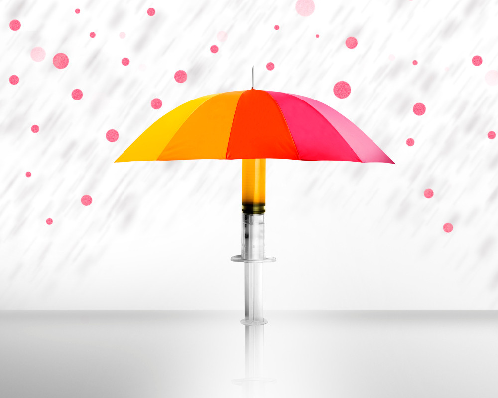 Regenschirm mit Spritze als Haltegriff