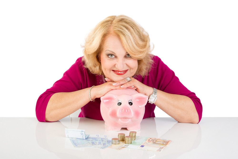 Frau und Sparschwein Frau und Sparschwein