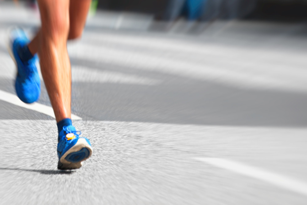 Füße und Beine eines Läufers