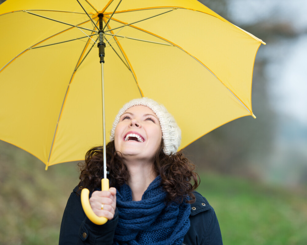 Frau mit Regenschirm