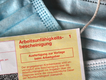 Masken und Arbeitsunfähigkeitsbescheinigung