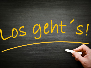 Schild mit Aufschrift "Los geht's"