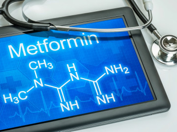 Tablet mit der chemischen Strukturformel von Metformin