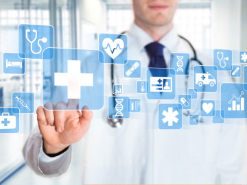 Arzt vor virtuellen Gesundheits-Icons