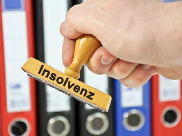 Stempel mit Insolvenz