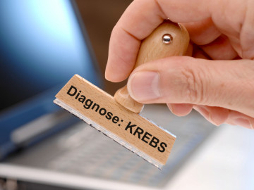 Stempel mit Aufschrift Diagnose: Krebs