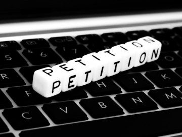 Wort Petition auf Tastatur