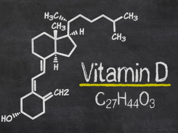 Schiefertafel mit der chemischen Formel von Vitamin D