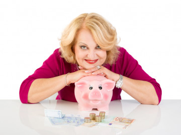 Frau und Sparschwein