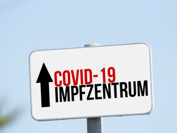 Hinweisschild zum Impfzentrum