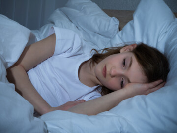 Kind im Bett